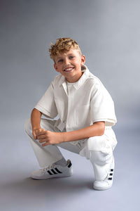 Cargo trousers for kids featuring multiple pockets and a durable design