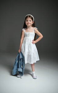 Maxi dress with ties for kids, featuring a flowy design and adjustable ties for a perfect fit