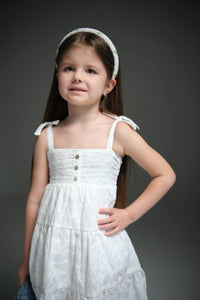 Maxi dress with ties for kids, featuring a flowy design and adjustable ties for a perfect fit