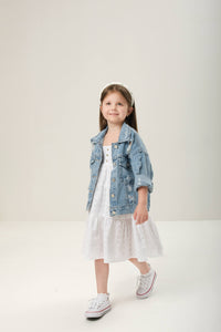 Maxi dress with ties for kids, featuring a flowy design and adjustable ties for a perfect fit