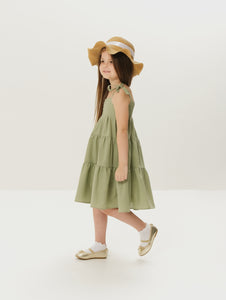 Maxi dress with ties for kids, featuring a flowy design and adjustable ties for a perfect fit