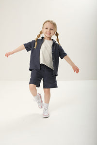 Linen short-sleeve shirt for kids, designed for a lightweight and breathable summer look