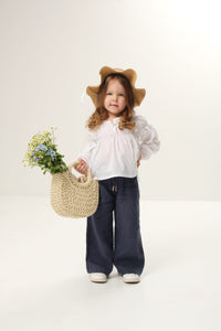 Long-sleeve blouse for kids, featuring a classic design and comfortable fit for various occasions