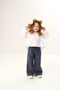 Wide leg linen trousers for kids, offering a breezy and comfortable fit with a stylish wide-leg design