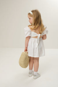 Puff-sleeves dress for kids with charming puffed sleeves and a stylish, playful design