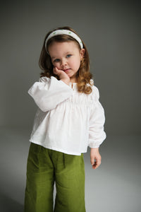 Wide leg linen trousers for kids, offering a breezy and comfortable fit with a stylish wide-leg design