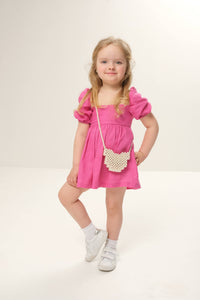 Puff-sleeves dress for kids with charming puffed sleeves and a stylish, playful design