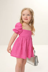 Puff-sleeves dress for kids with charming puffed sleeves and a stylish, playful design